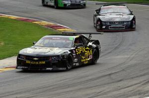 Mel Shaw's Chevy Camaro, Ricky Sanders's Chevy Camaro and Scott Ferguson's Pontiac GTO.R