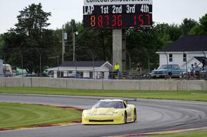 Doug Peterson's Chevy Corvette leads after eight laps