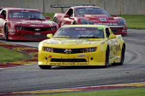 Bob Stretch's Chevy Camaro and Cameron Lawrence's Chevy Camaro with Amy Ruman's Chevy Corvette