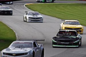 The Chevy Camaros of Kurt Roehrig, Gregg Rodgers, John Atwell, Adam Andretti and Tom West's Ford Mustang