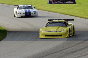 Doug Peterson's Chevy Corvette leads Cliff Ebben's Ford Mustang