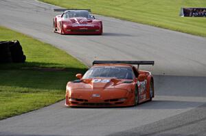 David Fershtand's Chevy Corvette ahead of Kyle Kelley's Chevy Corvette