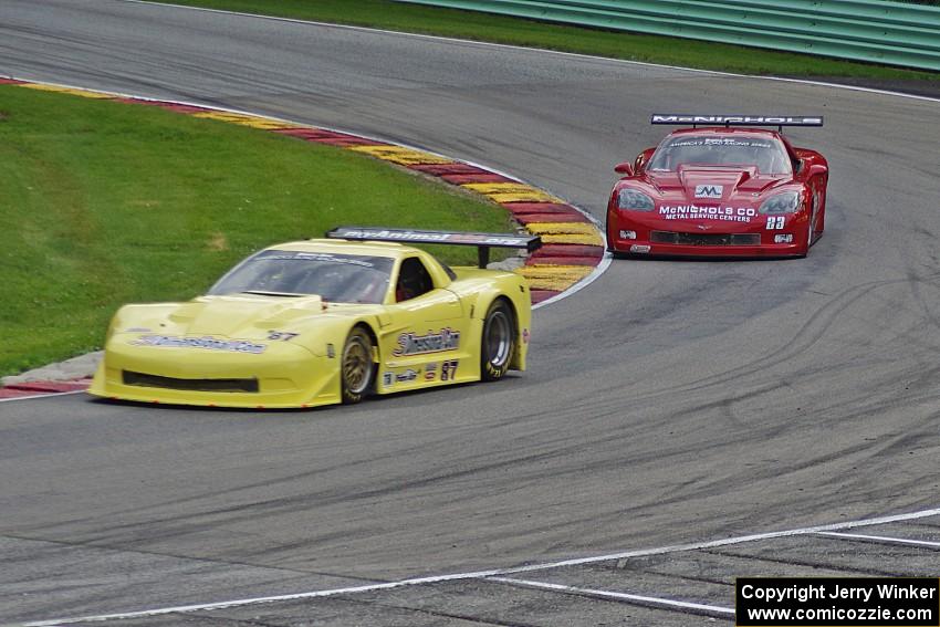 Doug Peterson's Chevy Corvette leads Amy Ruman's Chevy Corvette through Canada Corner on lap one