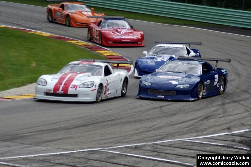 Kyle Kelley's Chevy Corvette, Ken Bupp's Chevy Camaro and the Chevy Corvettes of Rick Dittman, Jim McAleese and David Fershtand