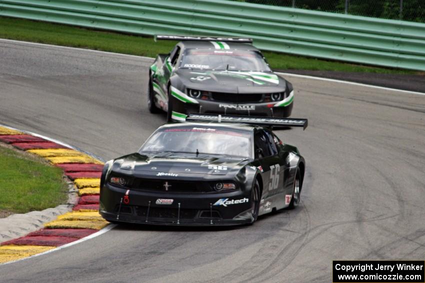 Tom West's Ford Mustang and Gregg Rodgers's Chevy Camaro