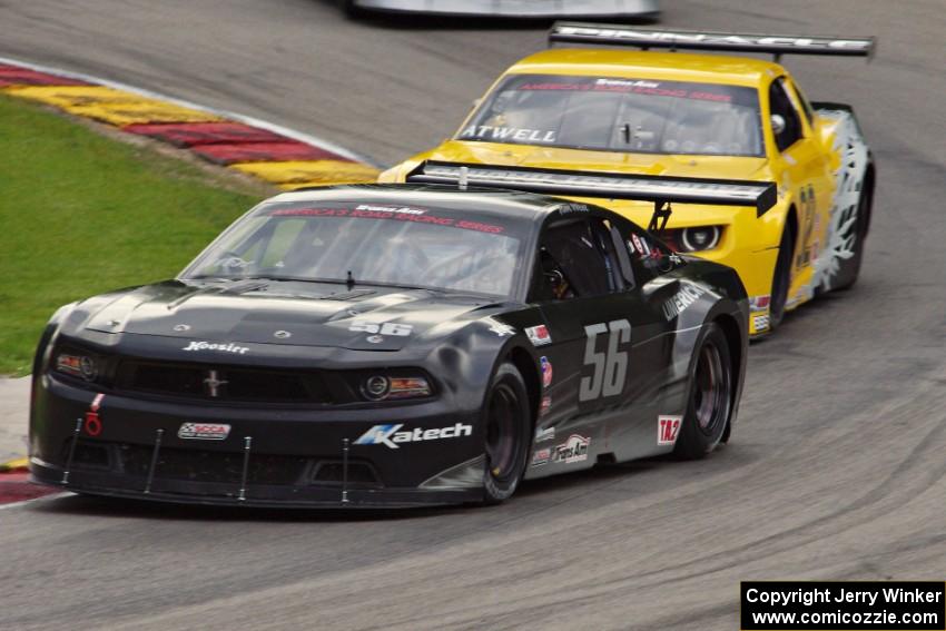 Tom West's Ford Mustang and John Atwell's Chevy Camaro