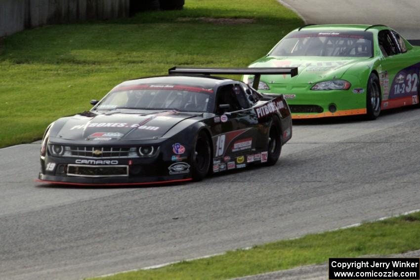 Ricky Sanders's Chevy Camaro and Bill Prietzel's Chevy Monte Carlo