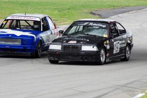 F1 1ab's (F1 Wannabees) BMW 325 with the British American Racing BMW 318i on the inside line