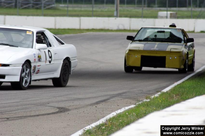 WrongGear Toyota Supra ahead of the Stillwater Chumps Toyota MR-2