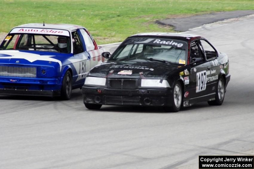 F1 1ab's (F1 Wannabees) BMW 325 with the British American Racing BMW 318i on the inside line