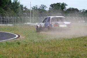 The Most Interesting Chumps In The World BMW 325i goes off at turn 4