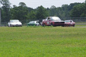 Five cars head through turn 4