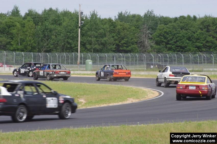 Six cars dive through turn 4