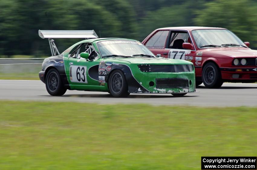 Miaro Racing Mazda Miata passes the Probs Racing BMW 325