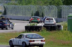 A non-stop stream of cars out of the carousel and into turn 10