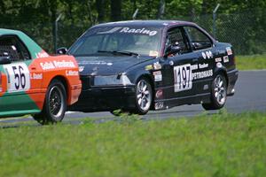 F1 1ab's (F1 Wannabees) BMW 325 chases the SoDak Petrolheads Mazda RX-7