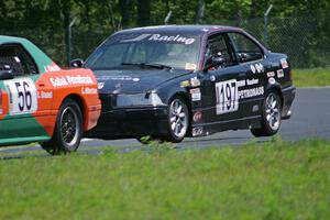 F1 1ab's (F1 Wannabees) BMW 325 chases the SoDak Petrolheads Mazda RX-7