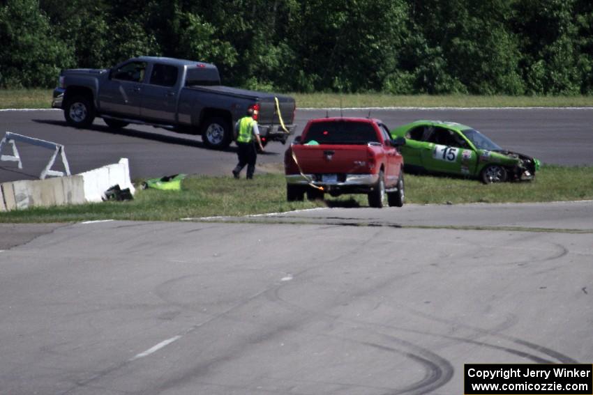 NNM Motorsports Dodge Neon is collected at turn 1 after an accident