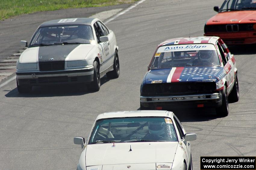 Four cars come through turn 12