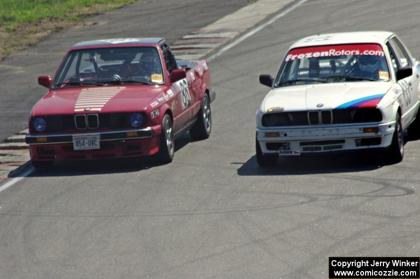 Missing Link Motorsport BMW 325 (left) gets passed by the Tubby Butterman Racing BMW 325