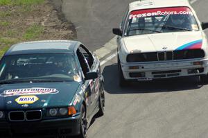 To Hell You Ride Racing BMW 325 about to be passed by the Tubby Butterman Racing BMW 325
