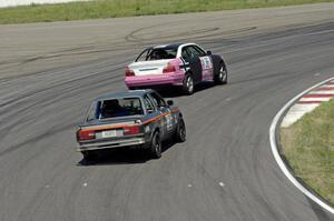 Ambitious But Rubbish Racing BMW 325 and North Loop Motorsports 2 BMW 325