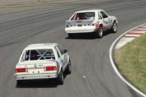 Motorcrap Racing Ford Mustang and Tubby Butterman Racing BMW 325
