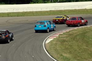 Four cars dive through turn 13