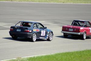 Flying Circus BMW 325i chases the Missing Link Motorsport BMW 325