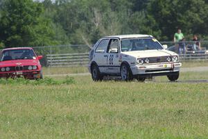 JAB Motorsport VW GTI and Probs Racing BMW 325