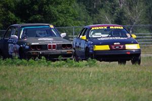 E30 Bombers BMW 325i and URA Tool Motorsports Ford Taurus SHO