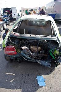 NNM Motorsports Dodge Neon showing the impact of the wreck. Note the engine is in the trunk!