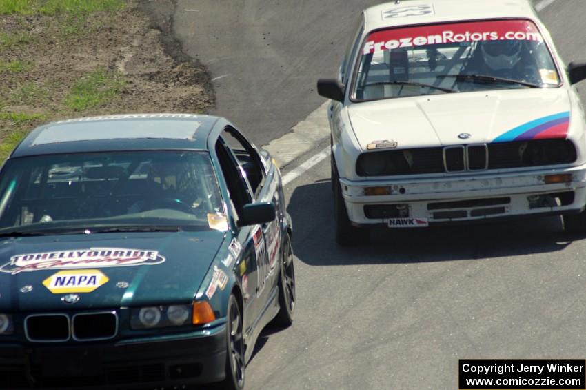 To Hell You Ride Racing BMW 325 about to be passed by the Tubby Butterman Racing BMW 325
