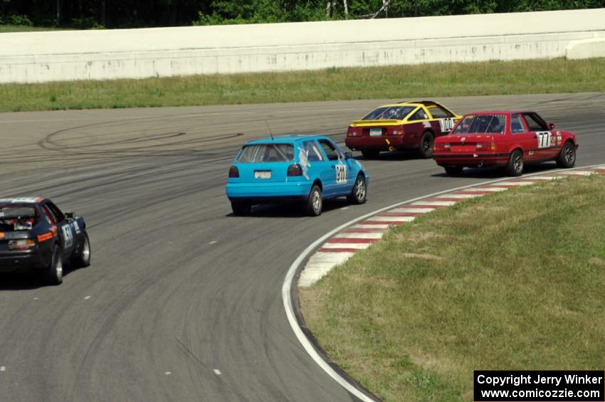 Four cars dive through turn 13