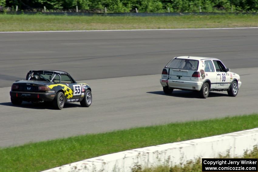 JAB Motorsport VW GTI and Team Party Cat Mazda Miata