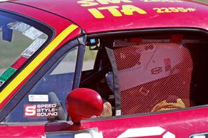 Greg Youngdahl sits in his Spec Miata Mazda Miata