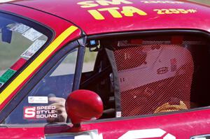 Greg Youngdahl sits in his Spec Miata Mazda Miata