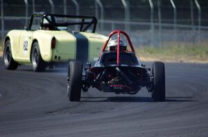 Jon Belanger's Autodynamics Mk. V Formula Vee chases John Hagen's Triumph TR-4