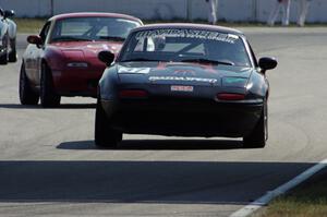 Chris Bienert's Spec Miata Mazda Miata and Greg Youngdahl's ITA Mazda Miata