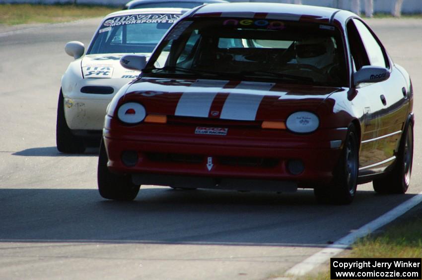 John Glowaski's ITA Dodge Neon ACR and Ray Yergler's ITA Mazda Miata