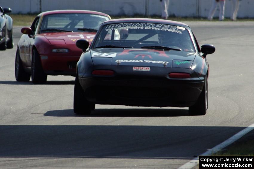 Chris Bienert's Spec Miata Mazda Miata and Greg Youngdahl's ITA Mazda Miata