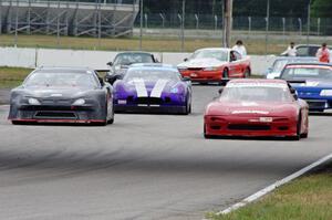 The eight cars for race group 2 line up for the green flag.