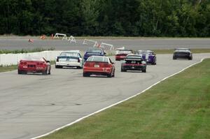 The eight cars for race group 2 line up for the green flag.