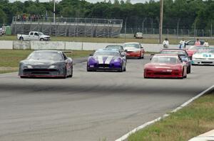 The eight cars for race group 2 line up for the green flag.