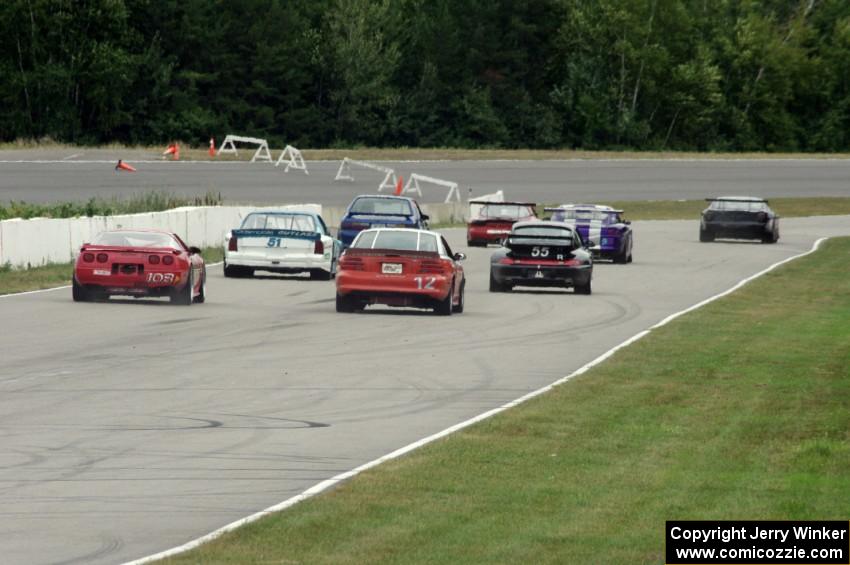 The eight cars for race group 2 line up for the green flag.