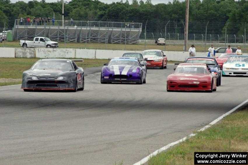 The eight cars for race group 2 line up for the green flag.