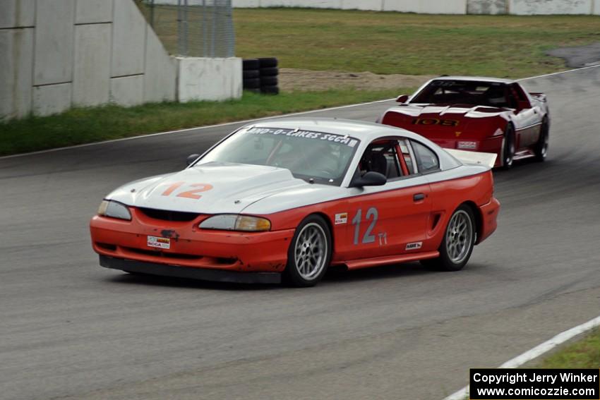 Tom Fuehrer's T1 Ford Mustang and Chris Johnson's ITE-1 Chevy Corvette