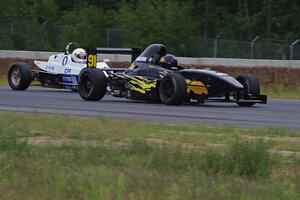 Andrew List's Formula Enterprises passes Alan Murray's Crossle 45F Formula Ford