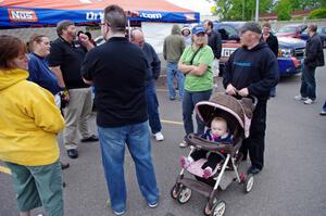 A group of people conversing and enjoying Rallyfest.