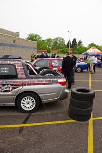 The Sullivan Van Way / Angela Van Way Subaru Brat with a stack of rally tires at the back.